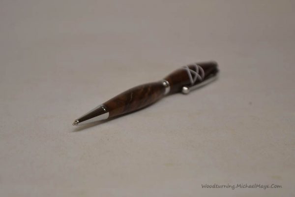 Walnut fancy slimline pen with white Celtic Knot